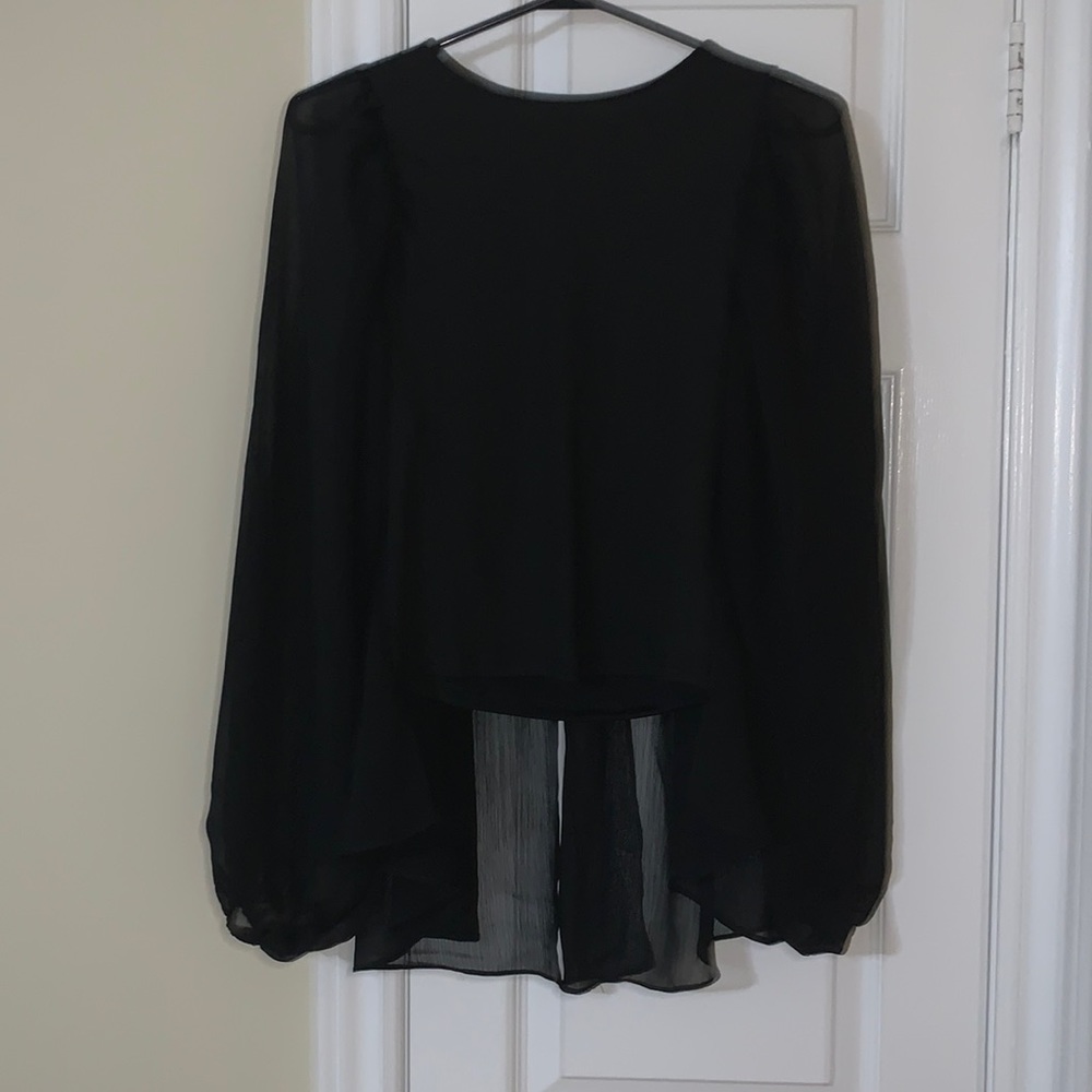 Black blouse.
